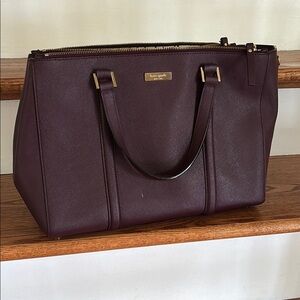 Excellent condition - Kate Spade Maroon purse with over the shoulder strap.